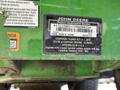 A label on a 2016 John Deere 1585 Terrain Cut detailing product identification number model number and safety compliance information