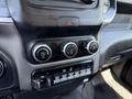 Close-up of the control panel in a 2020 Ram 2500 featuring climate controls and various function buttons