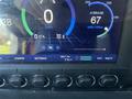 Dashboard display of a 2022 Lion Lion6 showing speed range battery charge settings and temperature indicators
