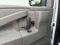Interior door handle and window control of a 2023 GMC Savana van