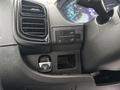 Interior controls and buttons of a 2023 RAM Promaster 3500 including air conditioning and power options