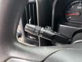 Close-up of the windshield wiper control stalk in a 2016 GMC Sierra 1500 featuring settings for front and intermittent wipers