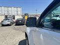 A 2017 Chevrolet Colorado parked at an outdoor location with its side mirror prominently visible in the foreground