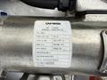 Close-up of a label on a motor featuring specifications such as speed amperage voltage and insulation class mounted on a metal component of a 2012 International TerraStar