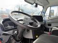 Dashboard and steering wheel of a 2022 Lion Lion6 vehicle displaying controls and instrument panel