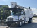 A white 2019 Freightliner M2 106 bucket truck with a mounted aerial lift system on the top and storage compartments on the side