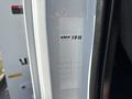 2019 Freightliner M2 106 door frame with a label featuring manufacturer details and a date written in black marker