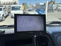 View of a Brigade monitor displaying a grainy image inside the cab of a 2010 Freightliner M2 106 truck