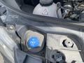 Close-up of the engine compartment of a 2024 Mercedes-Benz Sprinter showing the blue DEF only cap and various engine components