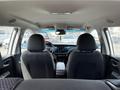 Interior view of a 2023 Chevrolet Bolt EV showing front seats dashboard and infotainment system