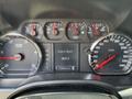 The dashboard of a 2020 Chevrolet Silverado showing speedometer, tachometer, engine hour meter, and odometer displaying 134960 kilometers