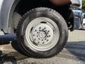 Close-up of a tire from a 2014 Ford F-550 showing the wheel rim and tire tread details