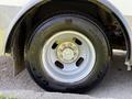Close-up of a 2020 Chevrolet Express wheel showing the tire brand General and the rim with five lug nuts