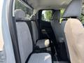 Interior view of a 2017 Chevrolet Colorado showcasing the back seat area with two bucket seats and a center console space