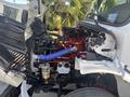 2022 Freightliner M2 106 engine with visible components including hoses wires and a blue intake pipe