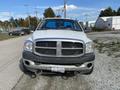 A 2009 Dodge Ram 5500 with a white exterior showing a prominent front grille and headlights
