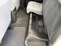 Interior view of the rear seating area of a 2018 Chevrolet Colorado showing the floor and seat securing mechanism