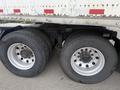 Close-up of the dual wheels and tires of a 2010 Great Dane 45-foot trailer showing the rim and tread patterns