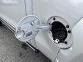 Close-up of the fuel filler cap of a 2017 Chevrolet Silverado 1500 showing the open cap and fuel nozzle receptacle