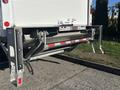 A 2022 Lion Lion6 truck with a hydraulic liftgate visible at the rear equipped with control mechanisms and safety features