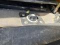 Control switch panel with a circular knob marked with "ON" and "OFF" settings in a Freightliner Cascadia truck interior