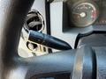 Close-up view of the steering wheel of a 2017 Ford F-650 Super Duty showing the turn signal lever and part of the instrument panel