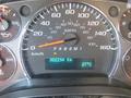 Speedometer and dashboard display of a 2020 Chevrolet Express showing a speed of 0 mph and 302294 km with a temperature reading of 27 degrees Celsius