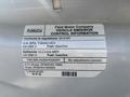 A label from a 2019 Ford Transit 350 detailing vehicle emission control information and regulatory compliance