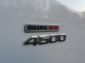 A close-up view of a Duramax Diesel 4500 badge on a 2015 GMC Savana