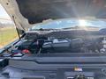 Close-up of the engine compartment of a 2017 Ford F-250 SD showing the engine and surrounding components with the hood raised