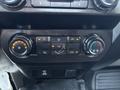 Control panel of a 2022 Ford F-350 SD with knobs for air conditioning and ventilation settings