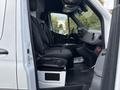 Interior view of a 2020 Mercedes-Benz Sprinter 2500 showing two front seats and the dashboard with controls