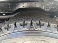 Close-up of a tire tread from a 2020 Chevrolet Express showing deep grooves and texture designed for traction and stability