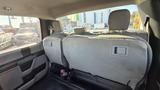 Interior view of the backseat of a 2016 Ford F-150 showing gray upholstery and headrests