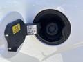 Fuel cap of a 2019 Ford F-150 showing the Easy Fuel system with instructions for refueling