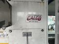A 2006 Ford Econoline with signage indicating it was sold and serviced by a company named Calco Equipment