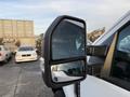 Side mirror of a 2018 Ford F-350 showcasing its rectangular design and sturdy construction