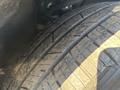 Close-up of the tire tread of a 2023 Fisker Ocean showing detailed grooves and patterns on the rubber surface