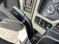 Close-up of the gear shift lever in a 2012 International 7400 showing markings for different gear positions
