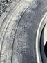 Set of 10 heavy duty tires with detailed markings including size 11 R 22.5 on the sidewall