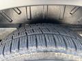 Close-up of a tire from a 2019 Ford Transit 350 showing tread pattern and sidewall detail