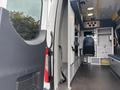 A 2020 Mercedes-Benz Sprinter 2500 interior showing a spacious cargo area with various storage compartments and a driver's seat visible