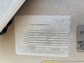 A faded inspection sticker from 2023 on a vehicle showing details like inspection type make model and inspection date