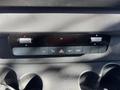 The control panel of a 2021 Mercedes-Benz Sprinter 2500 featuring buttons for AC heating and ventilation functions