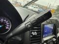 Close-up of the steering column with the gear shift lever labeled Drive Mode on a 2020 Ford F-550