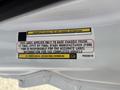 Label on the inner structure of a 2023 RAM Promaster 3500 displaying vehicle information and instructions for the base chassis and final stage manufacturer