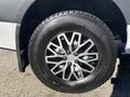 A close-up of a 2021 Mercedes-Benz Sprinter 2500 wheel featuring a multi-spoke alloy rim and a winter tire with visible tread pattern