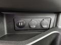 A close-up view of a dashboard panel featuring two USB ports and two 12-volt power outlets