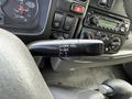 Close-up of a control stalk with settings for windshield wipers including mist off pull intermittent and low high speed functions
