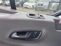 Interior door handle and control panel of a 2021 Ford Transit-350
